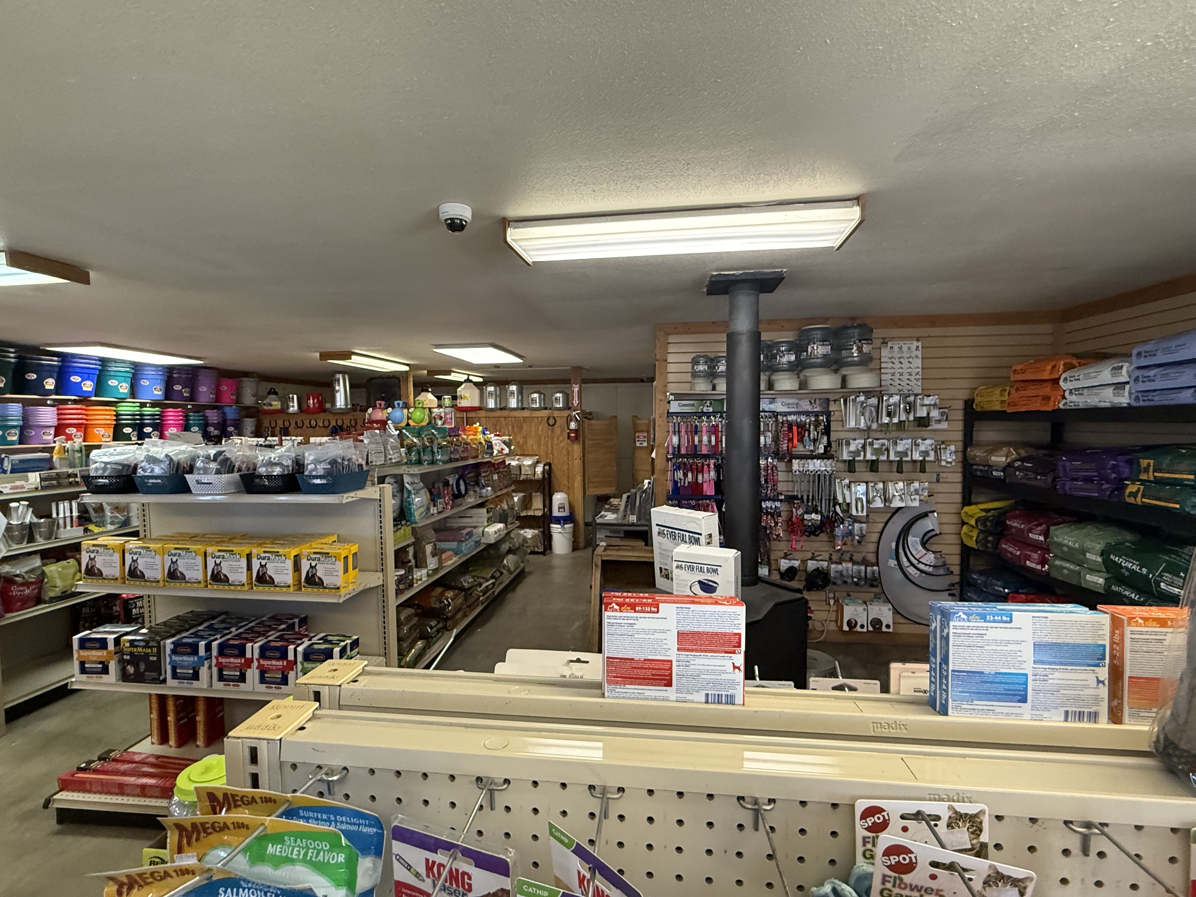 Shelves stocked with feed and pet supplies